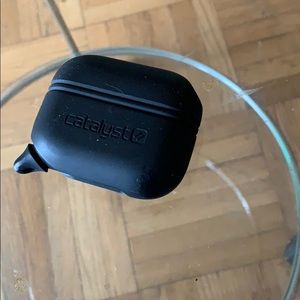 AirPods Pro case and charger plug